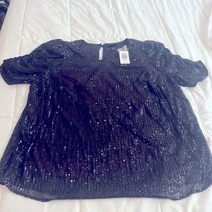 Black sequined torrid top size 1. New with tags.